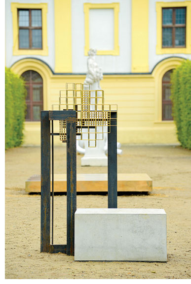 Carol Bove, Floras Garden, 2012, petrified wood, steel, bronze, brass, concrete, dimensions variable. Photo: Nils Klinger.