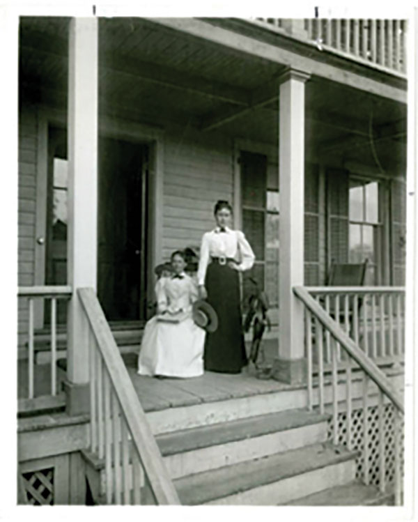 Josephine Lyon Holley, with daughter Constant Holley MacRae on the front porch of the Holley boarding house, c. 1900. At Greenwich Historical Society.