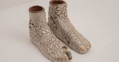 Elizabeth Atterbury, Second Feet (Molting), 2025, ceramic, glaze, shells, rock, 9¾ x 6 x 3" (each foot). Photo: Boru O’Brien O’Connell. At Center for Maine Contemporary Art.
