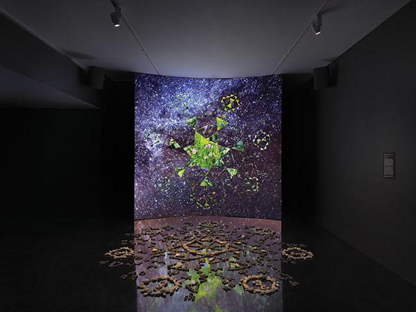 Kite, Wičháhˇpi Wóihaŋbleya (Dreamlike Star), 2024, multimedia environment with video, sound, stones, mirror; 21:16 min. Installation view. Courtesy the artist. Photo: Dario Lasagni. At MIT List Visual Arts Center.