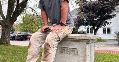 Artist Christopher Frost with Unseen/Unforgotten. At Robbins Memorial Library.