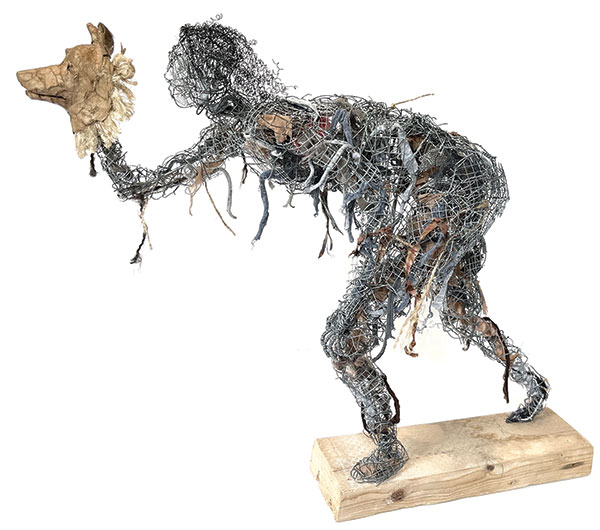 Sally Moore, Entrance, 2025, wire, fabric, papier mâché, 22 x 18 x 6". At Boston Sculptors Gallery.